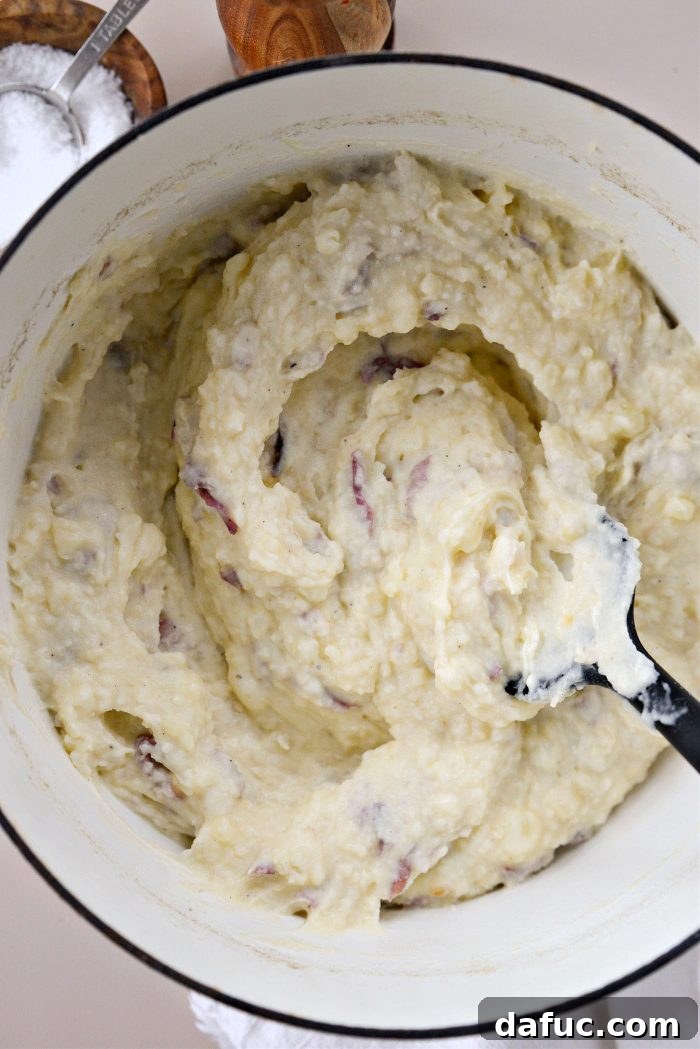 Velvet Garlic Potatoes 15 Mashed potatoes warming through in the pot before serving