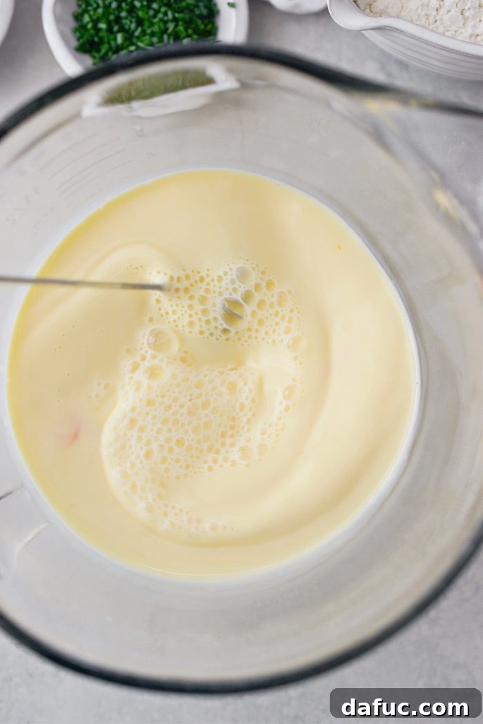 Fluffy Bacon Gruyere Clouds 7 whisk eggs and milk until frothy
