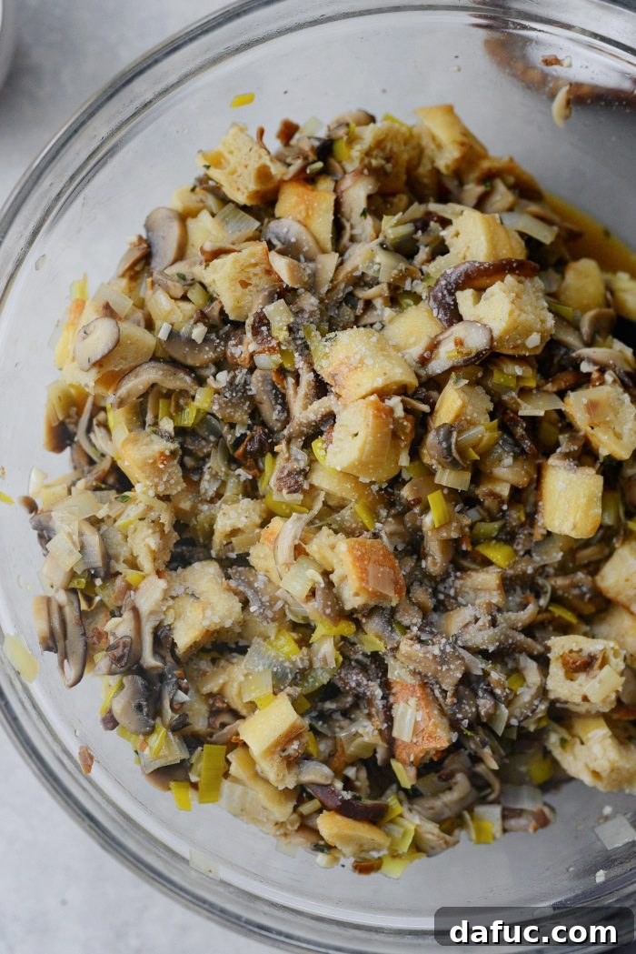 Gourmet Leek and Wild Mushroom Stuffing 16 Mushroom and bread stuffing mixture in a bowl, ready for final seasoning