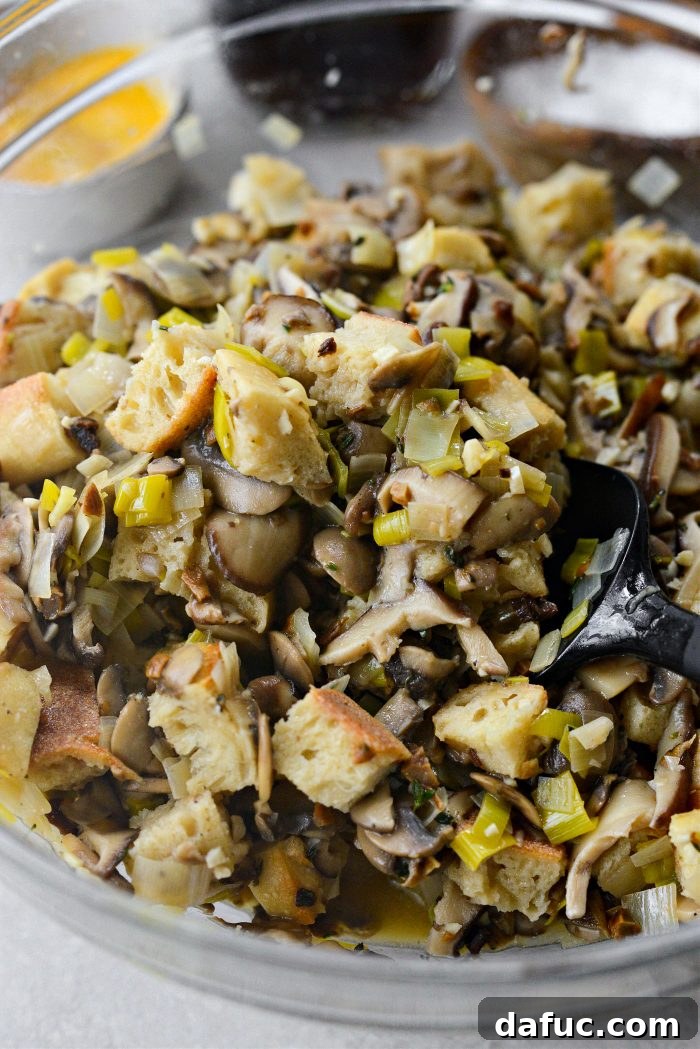 Gourmet Leek and Wild Mushroom Stuffing 18 Tossing the stuffing mixture one last time to combine the egg