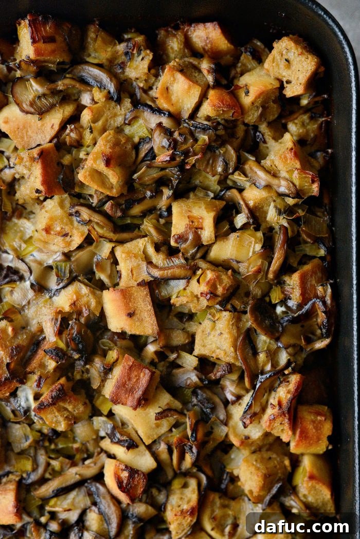 Gourmet Leek and Wild Mushroom Stuffing 23 Overhead view of a prepared baking dish with Leek and Wild Mushroom Stuffing