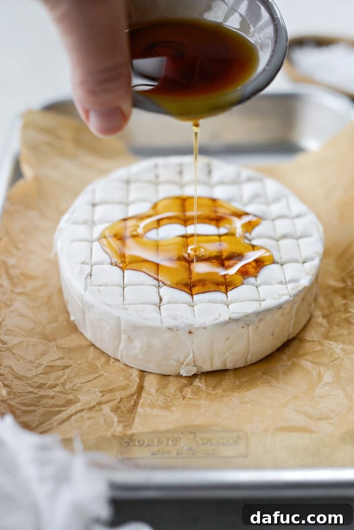 Golden Maple-Drizzled Brie with Ruby Cranberry Swirl 11 Pure maple syrup drizzled over scored brie cheese