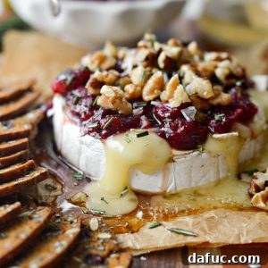 Golden Maple-Drizzled Brie with Ruby Cranberry Swirl 19 Maple Baked Brie with Cranberry Jam