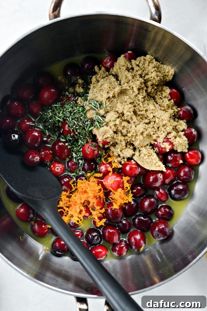 Golden Maple-Drizzled Brie with Ruby Cranberry Swirl 6 Cranberries, orange juice, brown sugar, orange zest, and chopped rosemary in a saucepan