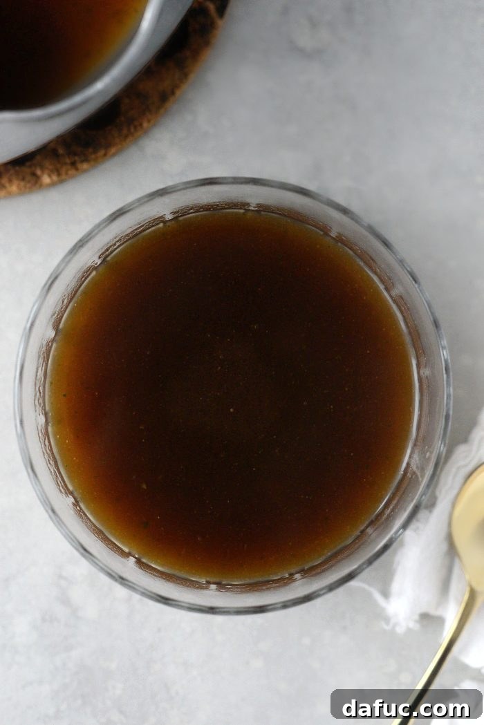 Homemade Au Jus Gravy Mix stored in a jar with label