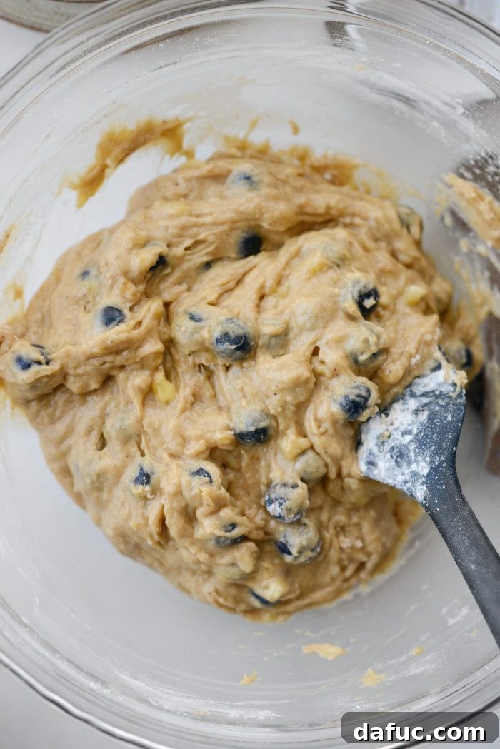 Blueberries gently folded into the banana bread batter