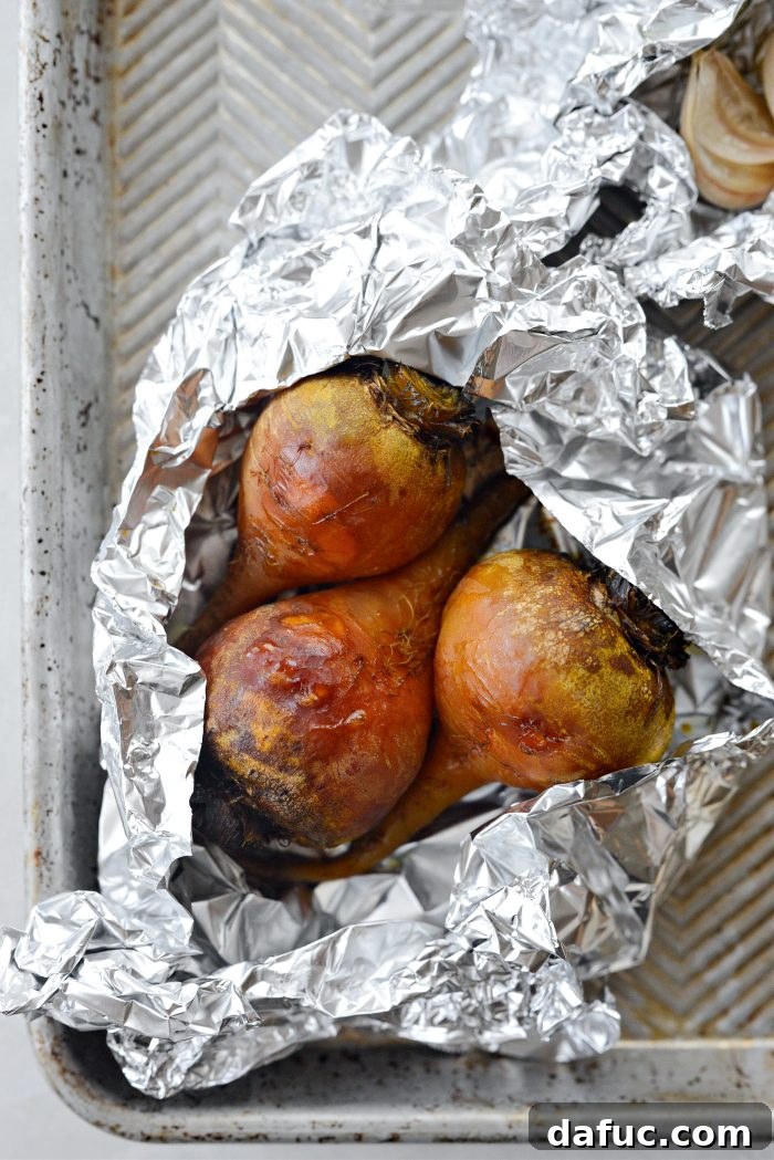Roasted golden beets, cooked and cooled, ready for peeling