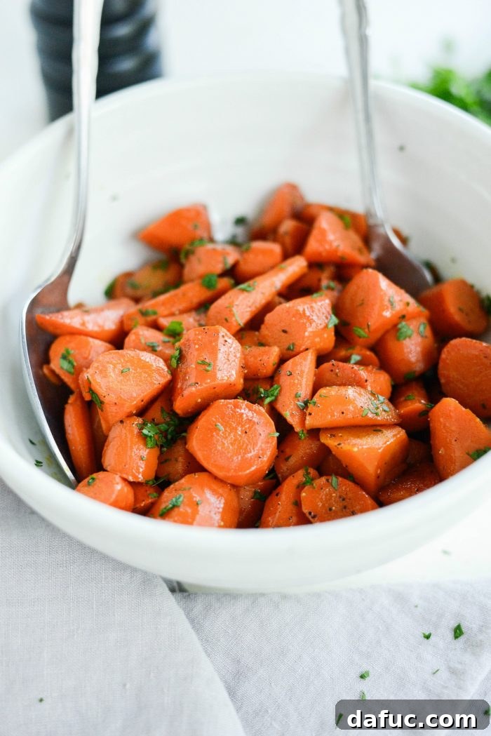Brown Sugar Glazed Carrots garnished with fresh parsley, adding a vibrant touch
