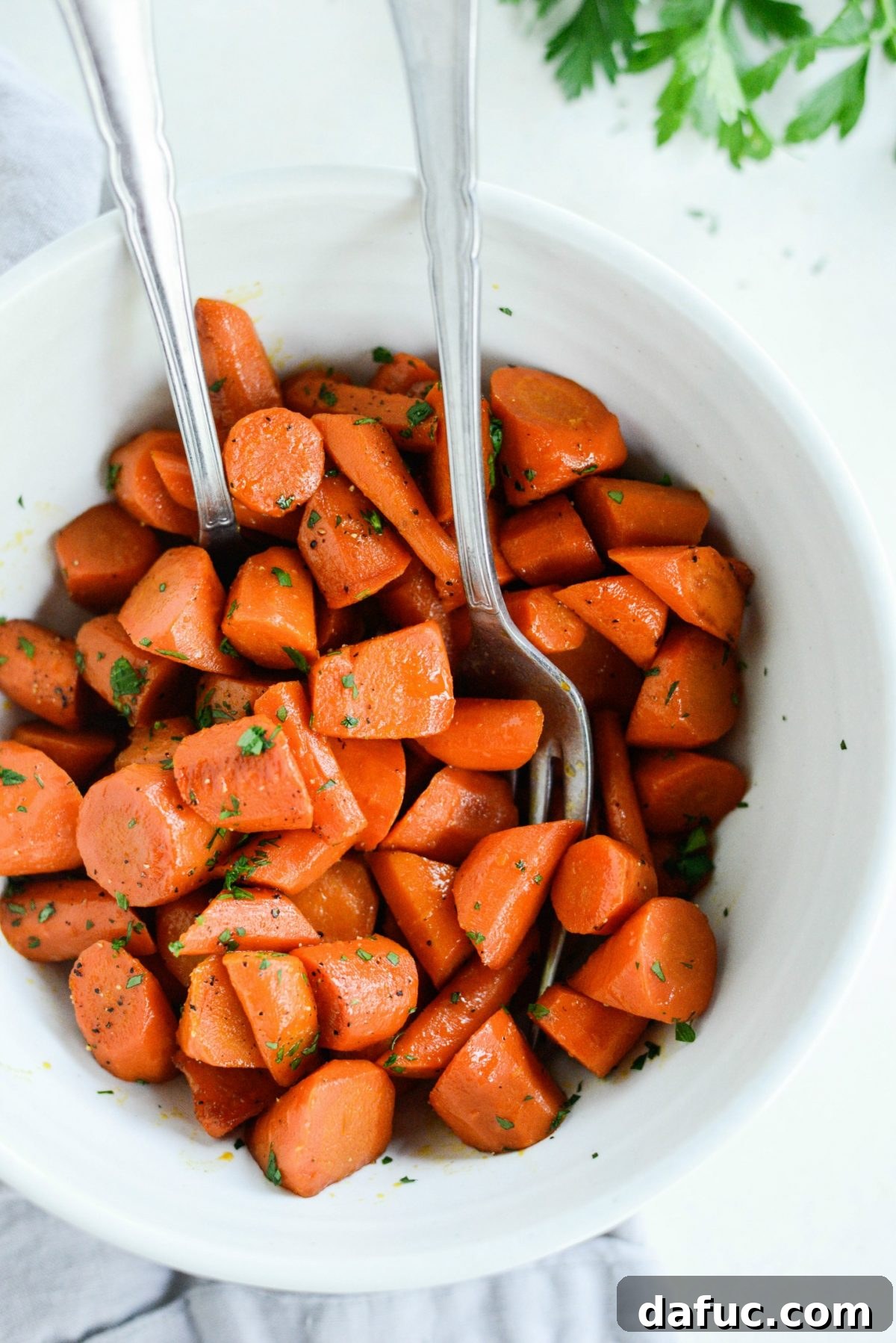 Caramelized Brown Sugar Carrots 13 Brown Sugar Glazed Carrots in a serving dish, ready to be enjoyed