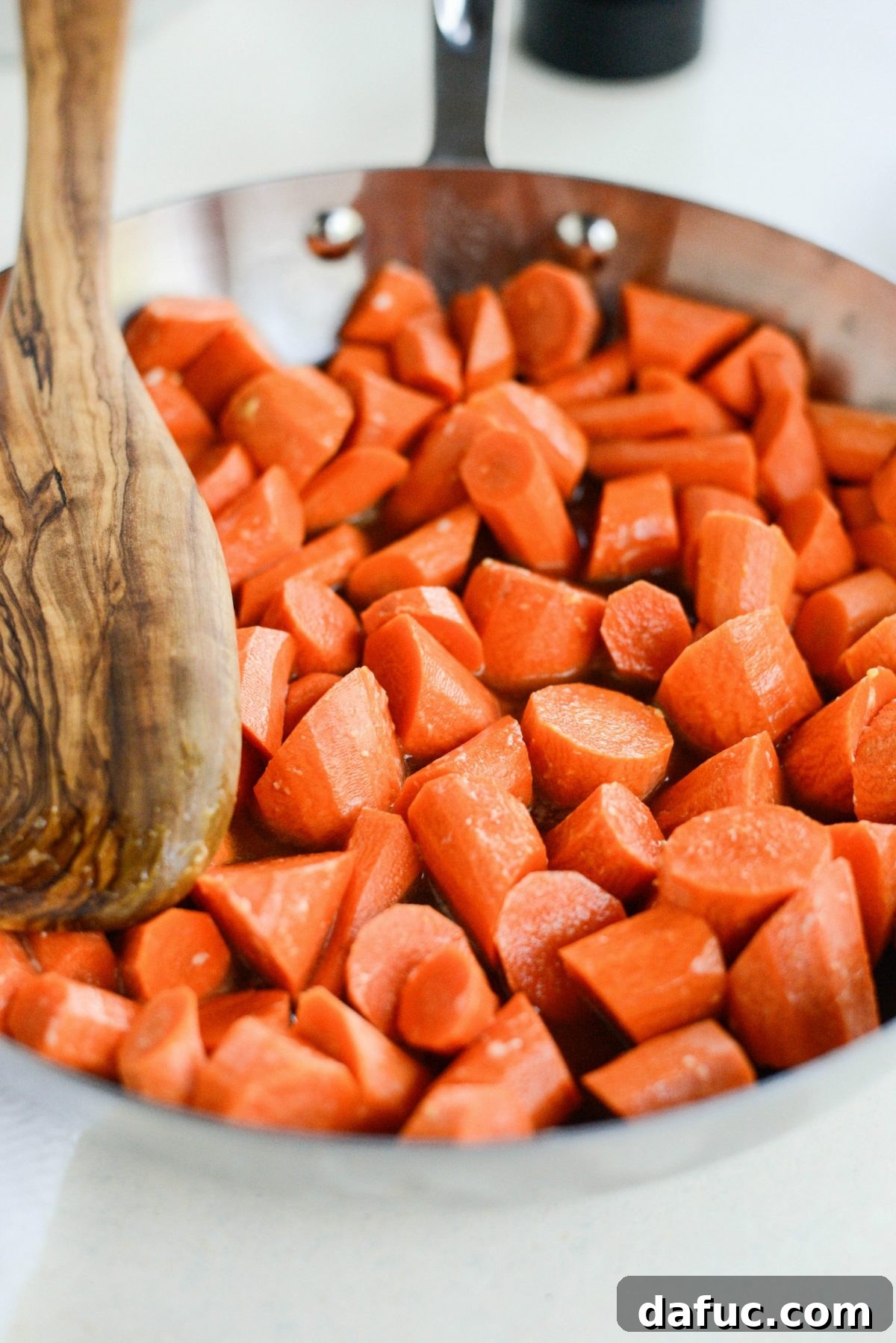 Caramelized Brown Sugar Carrots 6 Mixing the brown sugar, butter, and water in a skillet to form the glaze base