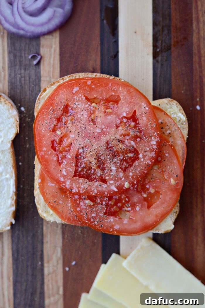 Irish Toast Delight 8 Topping buttered bread with sliced tomatoes, salt, and pepper
