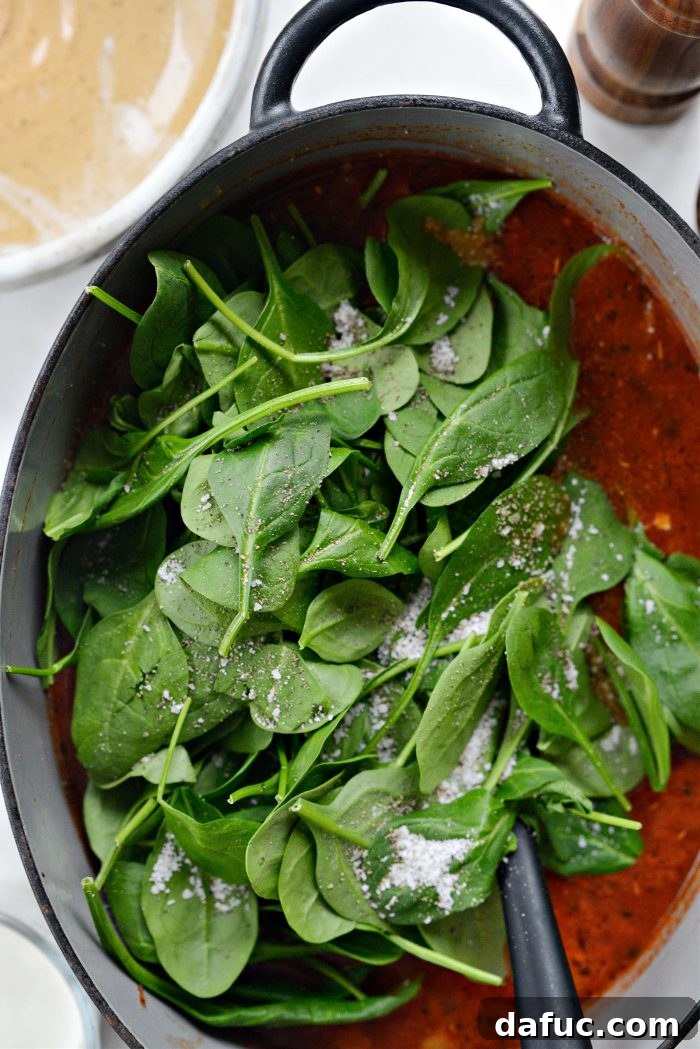 add spinach, salt and pepper