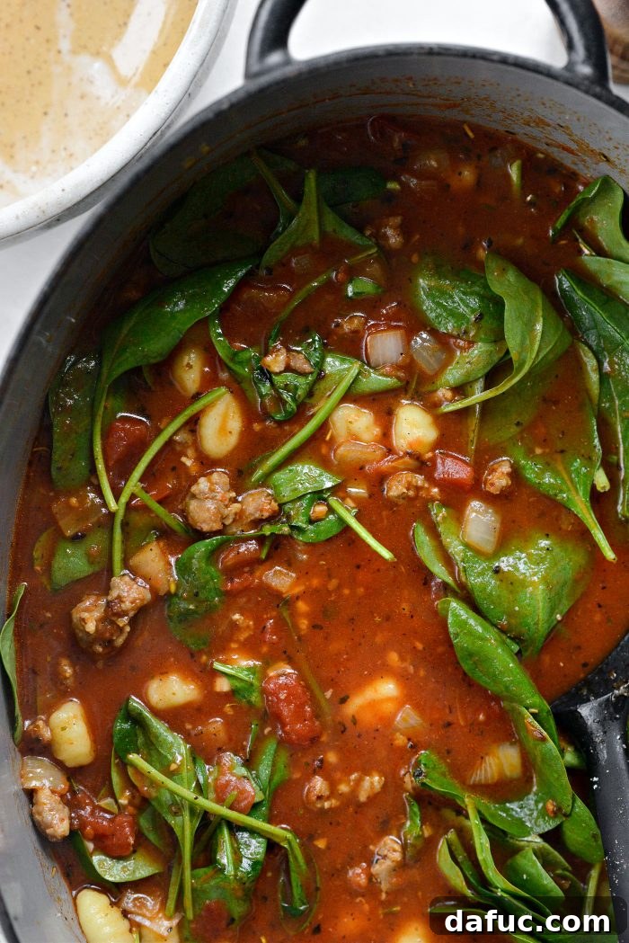 stir and cook until wilted