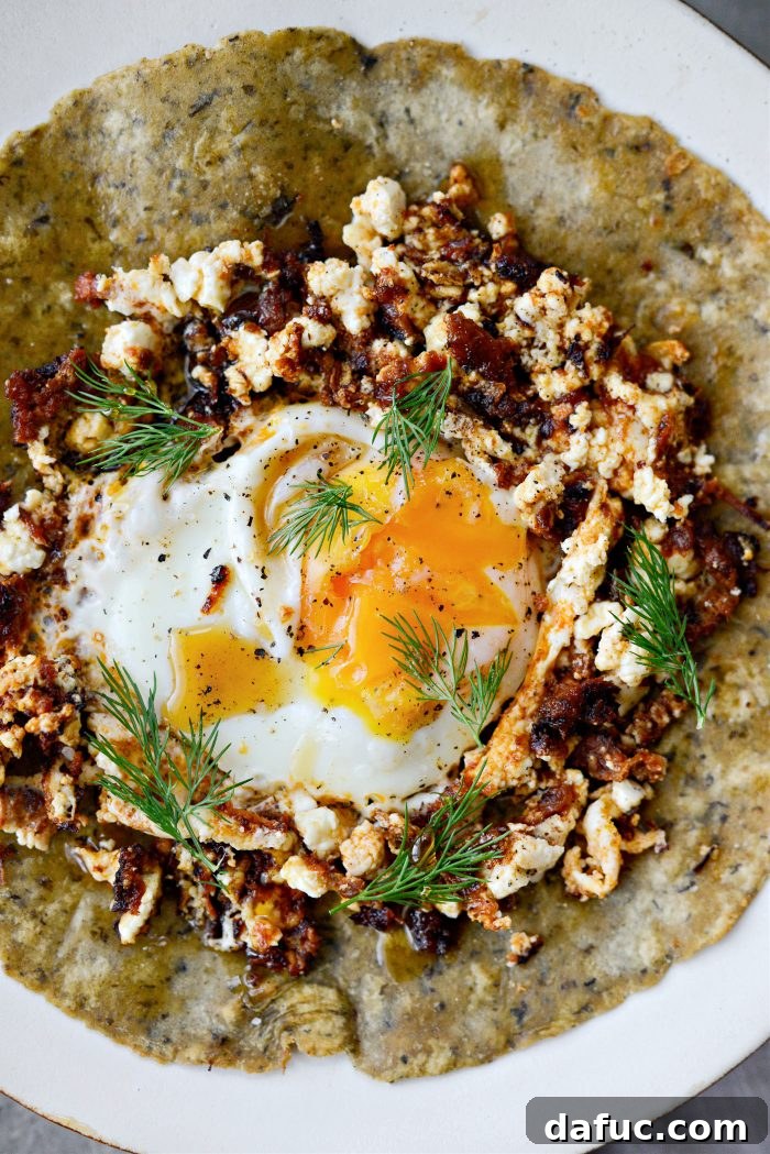 Three Delicious Feta Fried Egg Ideas 8 Sun-Dried Tomato Feta Fried Egg on a Toasted Tortilla with Fresh Dill