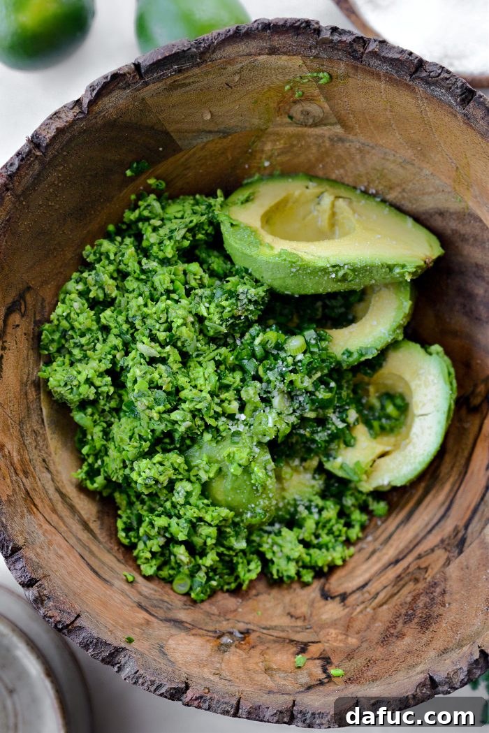 Vibrant Serrano Sweet Pea Guacamole 11 Avocados, pea mixture, green onions, and lime juice in a mixing bowl