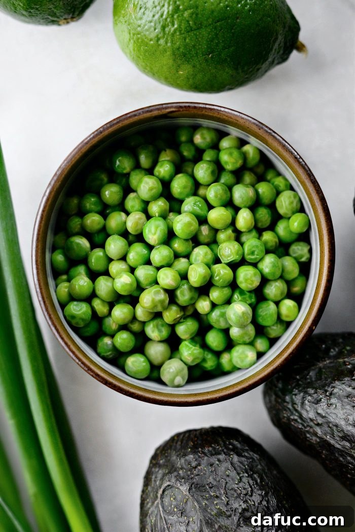 Vibrant Serrano Sweet Pea Guacamole 5 Bowl of vibrant green sweet peas, ready for guacamole