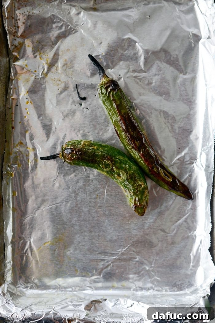 Vibrant Serrano Sweet Pea Guacamole 8 Charred serrano peppers after roasting, ready for peeling