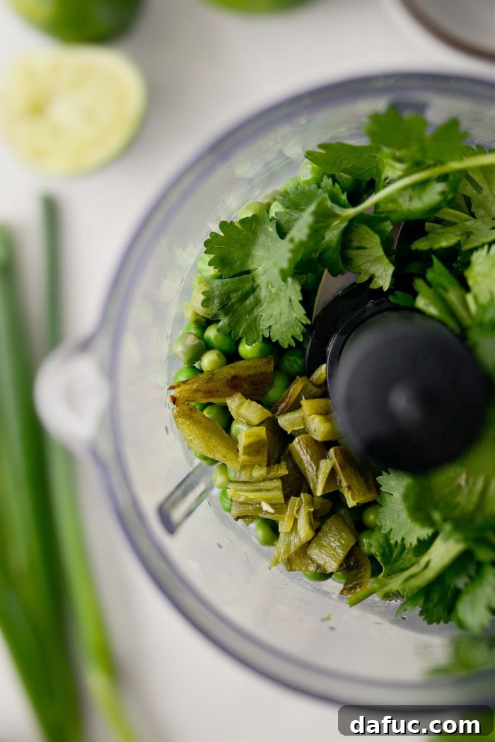 Vibrant Serrano Sweet Pea Guacamole 9 Sweet peas, fresh cilantro, and roasted serrano peppers in a food processor