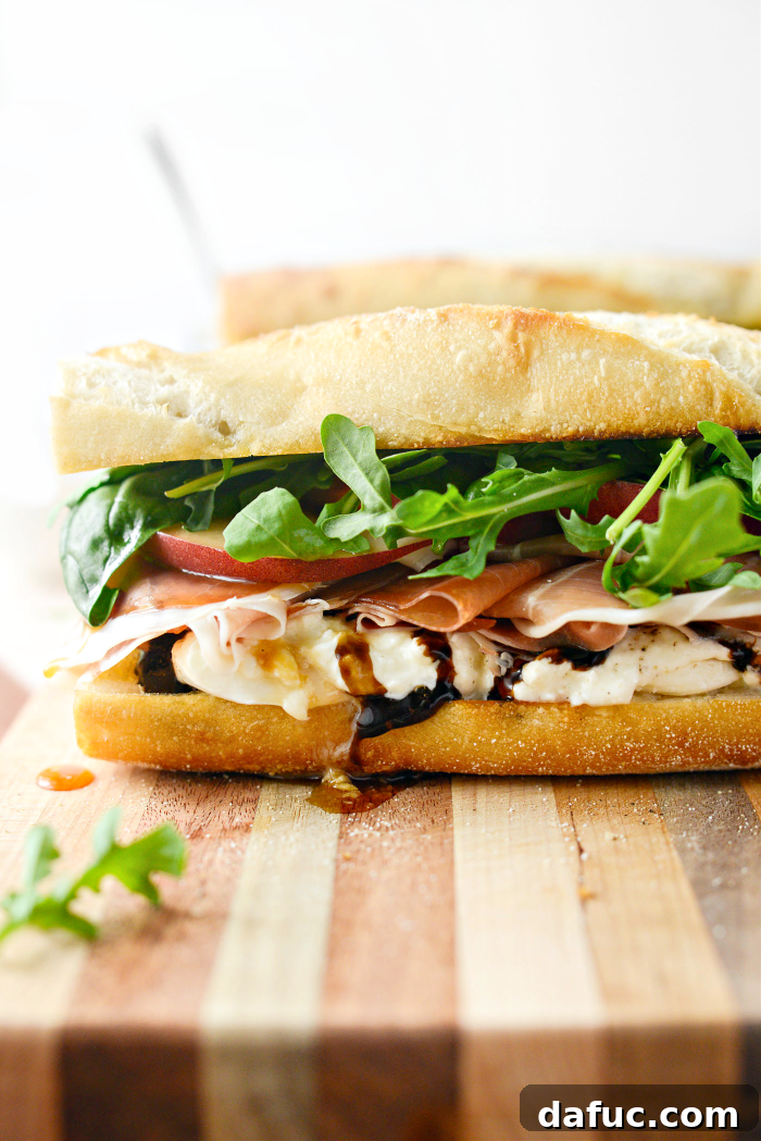 Peach Prosciutto and Burrata Sandwich - A gourmet summer delight with creamy burrata, salty prosciutto, and sweet peaches