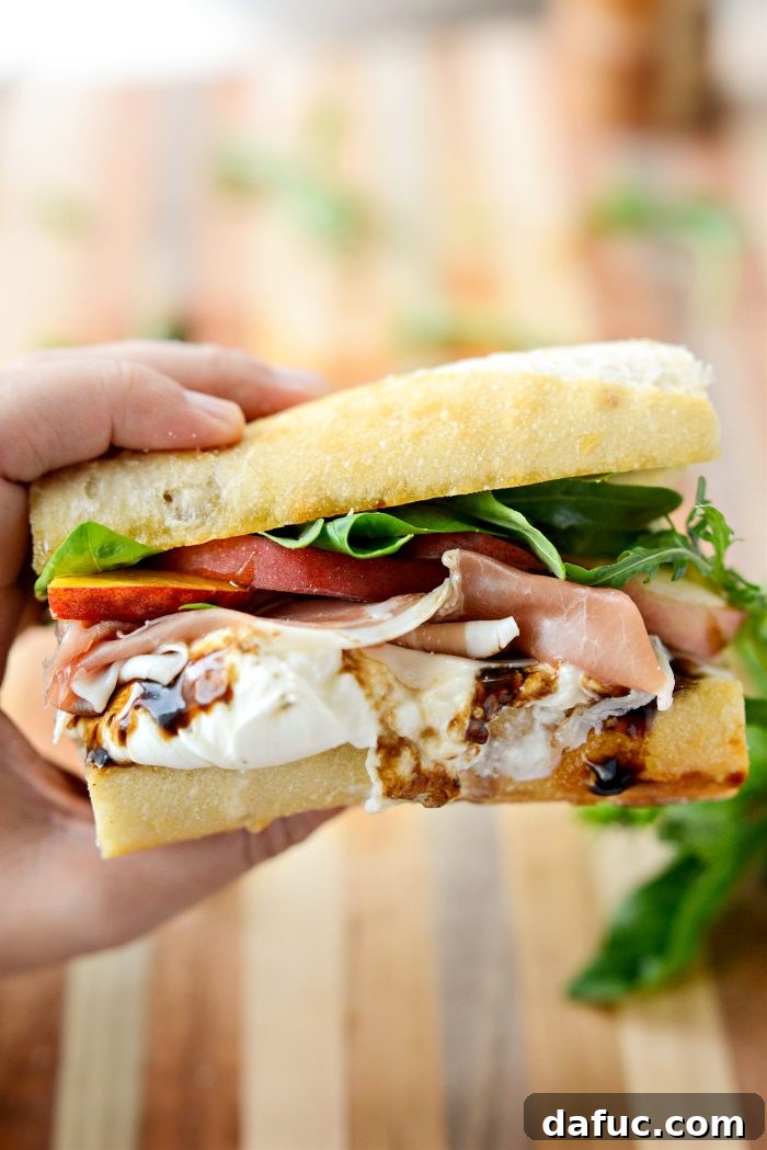Final stunning image of the Peach Prosciutto and Burrata Sandwich, perfect for social media