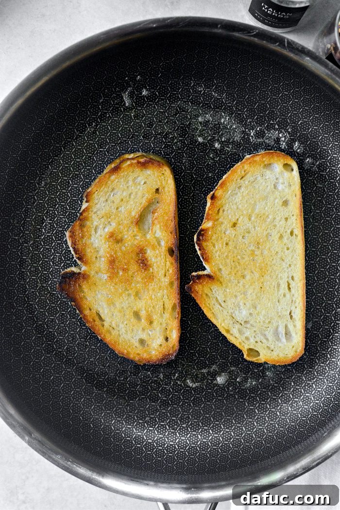Margherita Toast Pizzas 5 Toasting sourdough bread in a pan with butter