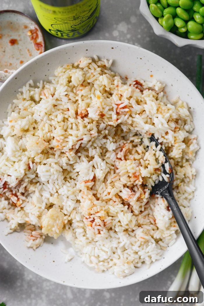 Zesty Crisped Rice Medley 8 Tossing rice mixture to combine chili paste and oil