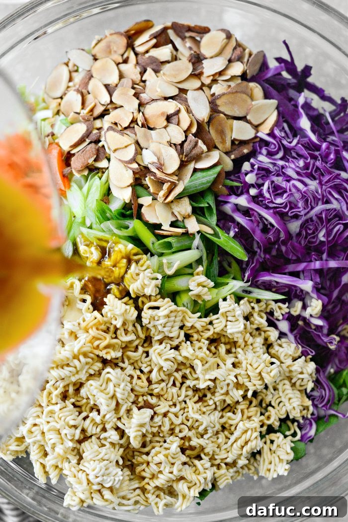 Crispy Asian Ramen Salad 11 pour in dressing