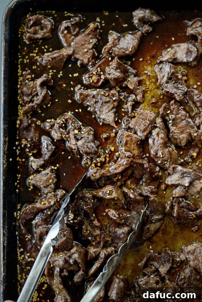 Sheet Pan Steak and Broccoli 12 Tossing steak in sauce on the sheet pan before broiling for caramelization