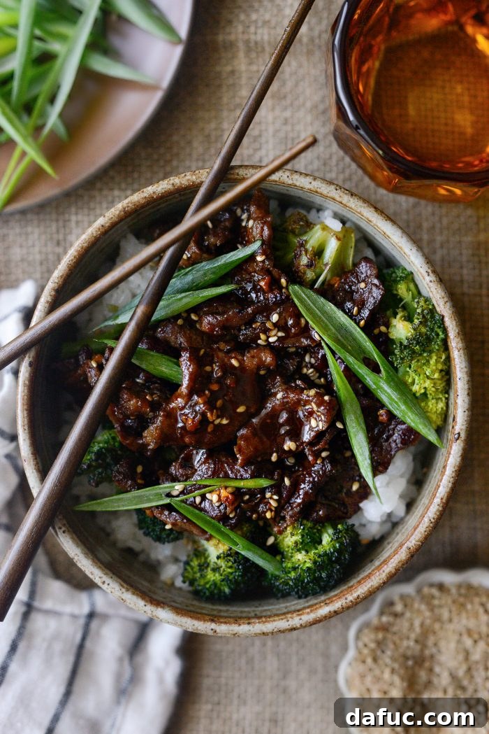 Sheet Pan Steak and Broccoli 16 A close-up shot of a single serving of Sheet Pan Beef and Broccoli, highlighting the tender beef and vibrant broccoli