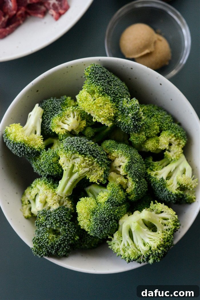 Sheet Pan Steak and Broccoli 6 Fresh broccoli florets in a bowl, prepared for roasting