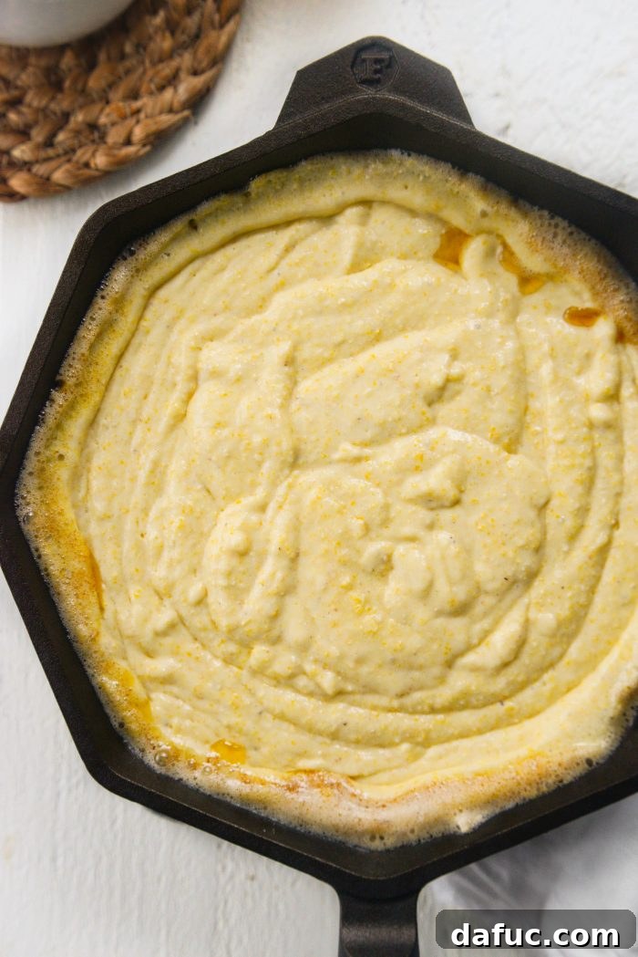 Honey Butter Glazed Golden Cornbread 14 pour batter into skillet