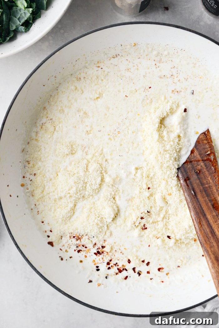 Stir the cream sauce to combine ingredients