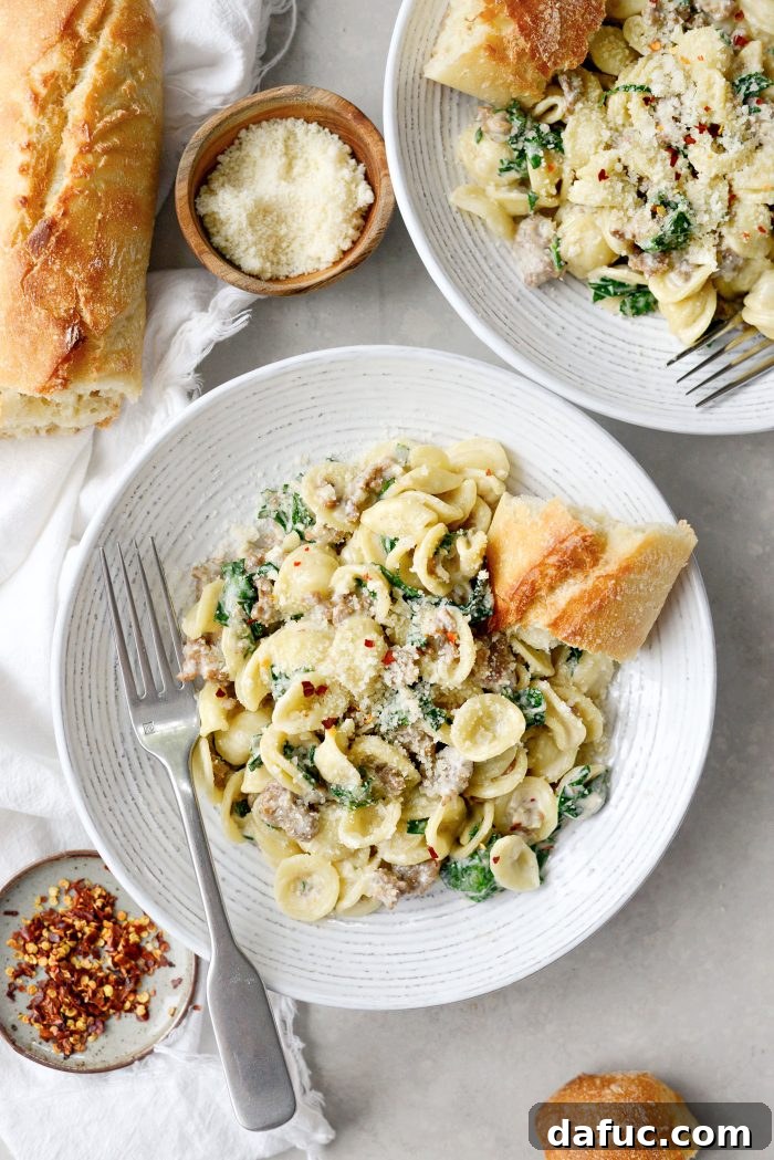 Final plated shot of Parmesan Orecchiette with Sausage and Kale