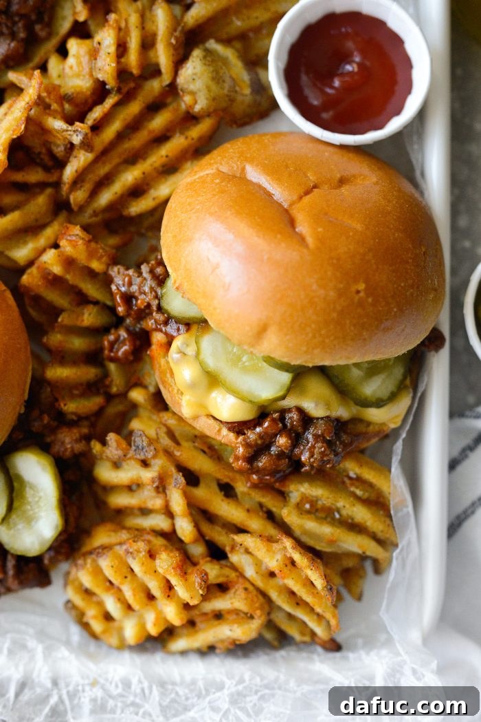 Sloppy joe on a bun with cheese melting