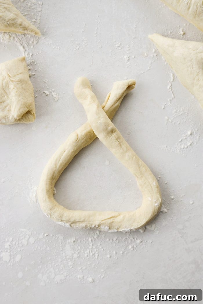 Roll and stretch dough into a rope