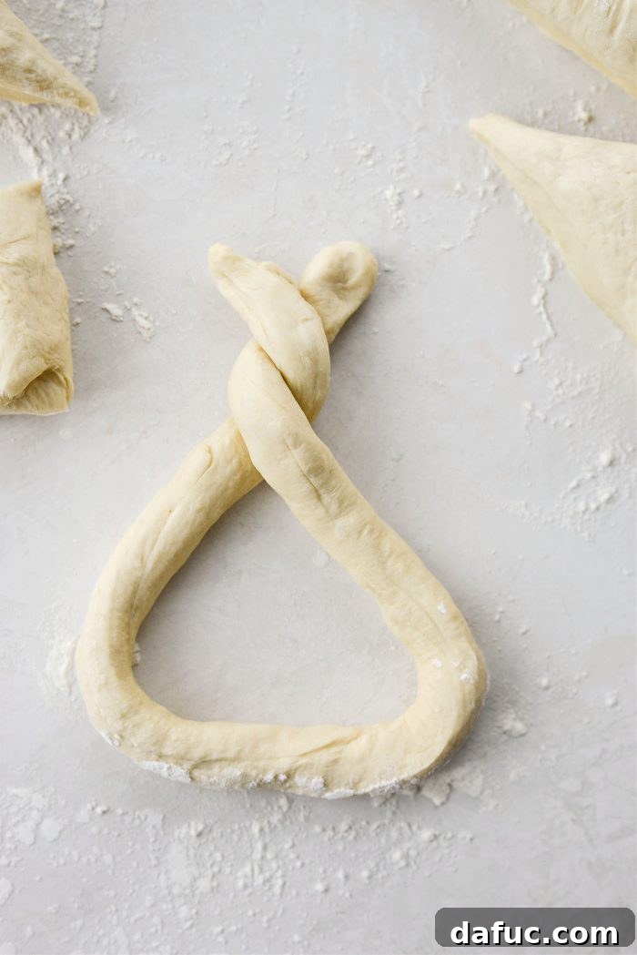 Twist the pretzel dough once