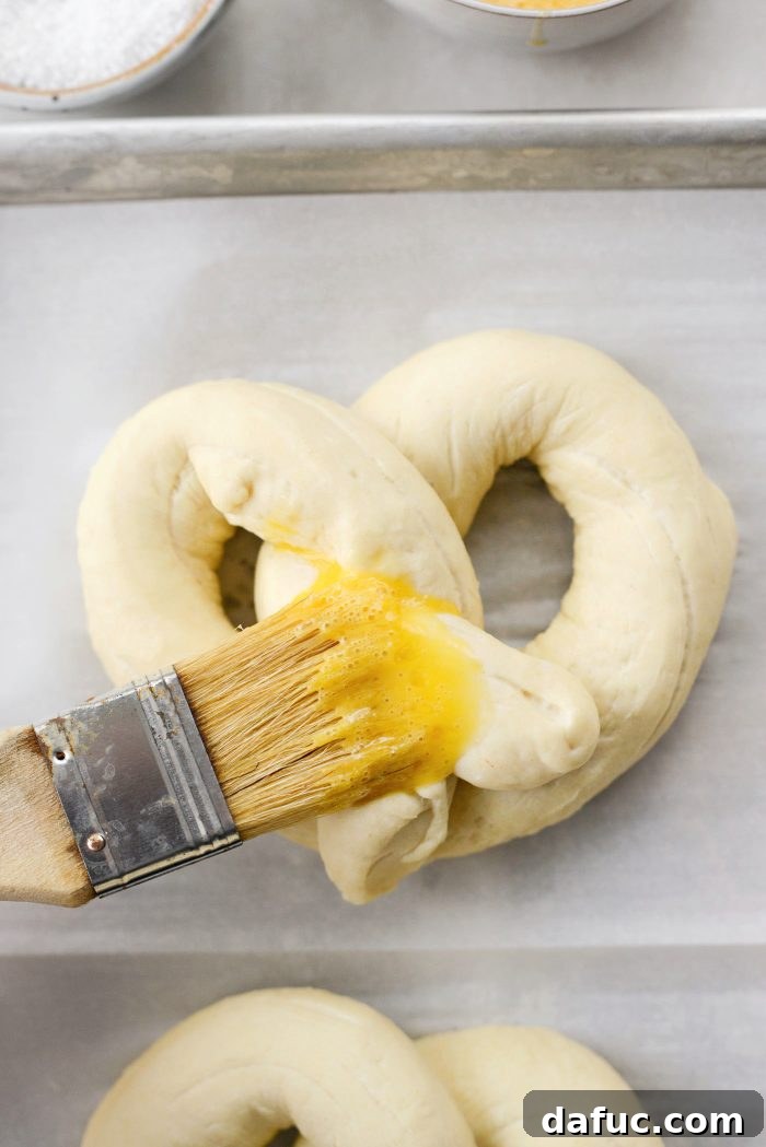 Brush pretzels with egg wash