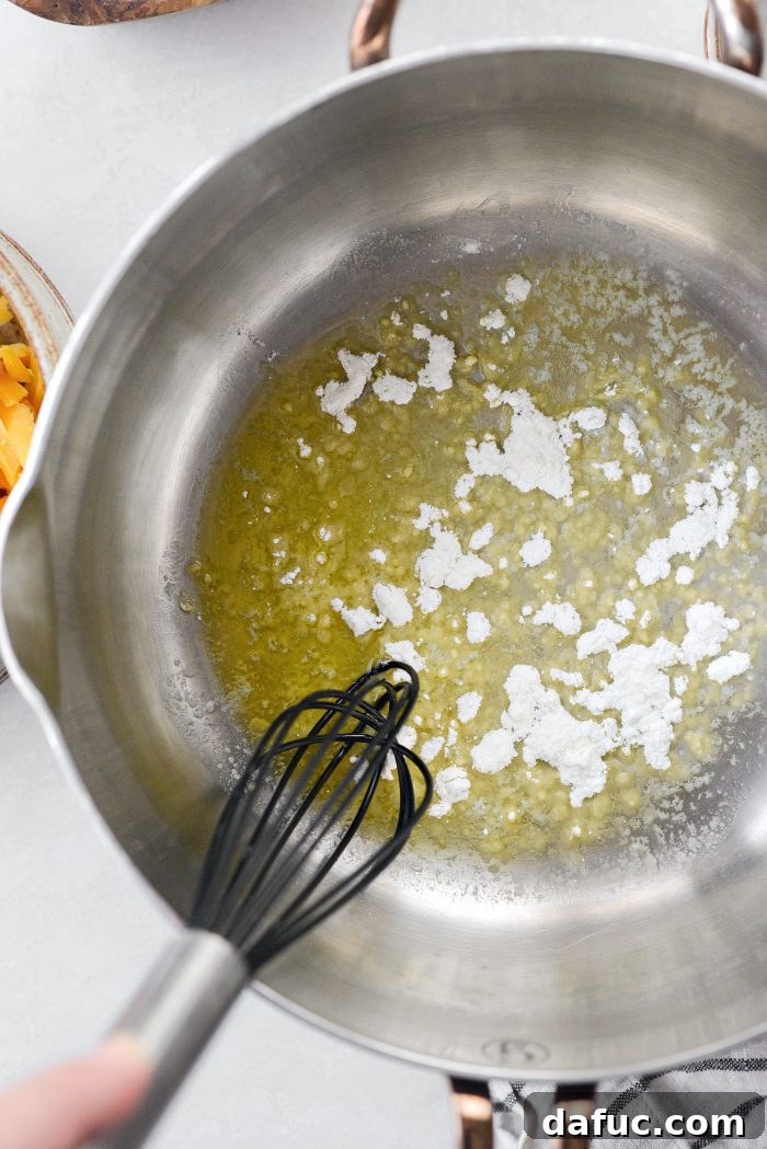 Melt butter and whisk in flour for cheese sauce
