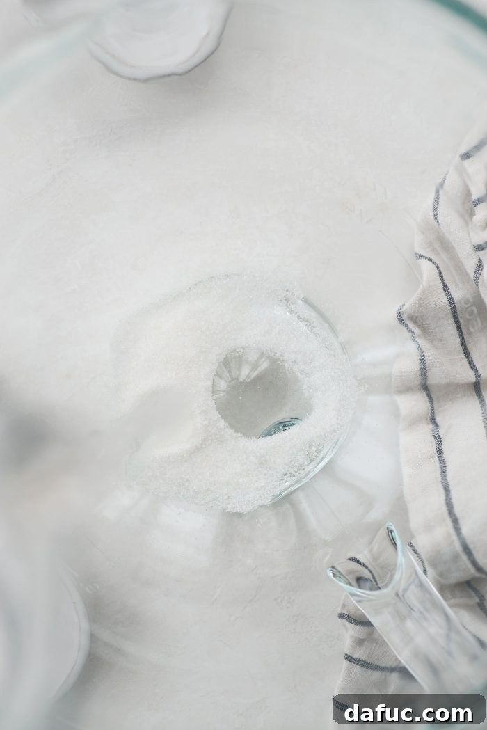 Sugar and water in mixing bowl