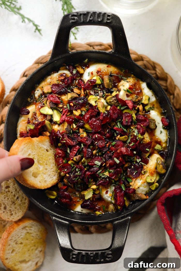 Chili Honeyed Chèvre Indulgence 12 Close-up of the fully garnished Hot Honey Goat Cheese Dip, showcasing its vibrant toppings and inviting texture.