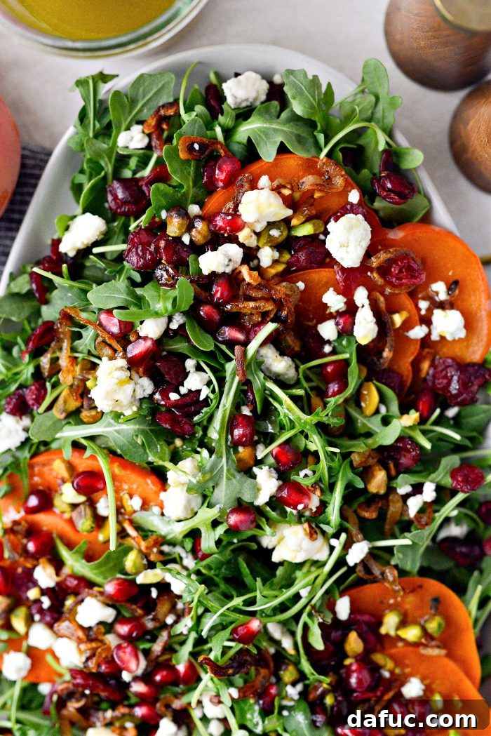 Persimmon and Pomegranate Arugula Salad