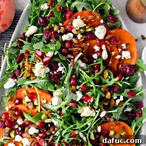 Persimmon and Pomegranate Arugula Salad