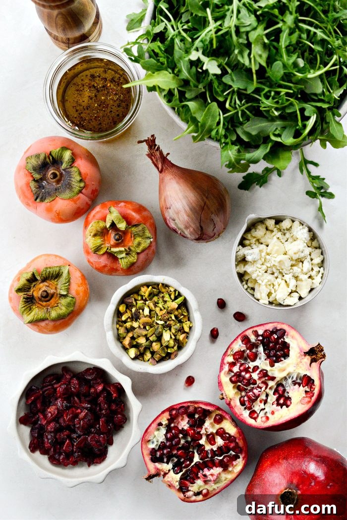 Ingredients for Persimmon and Pomegranate Arugula Salad