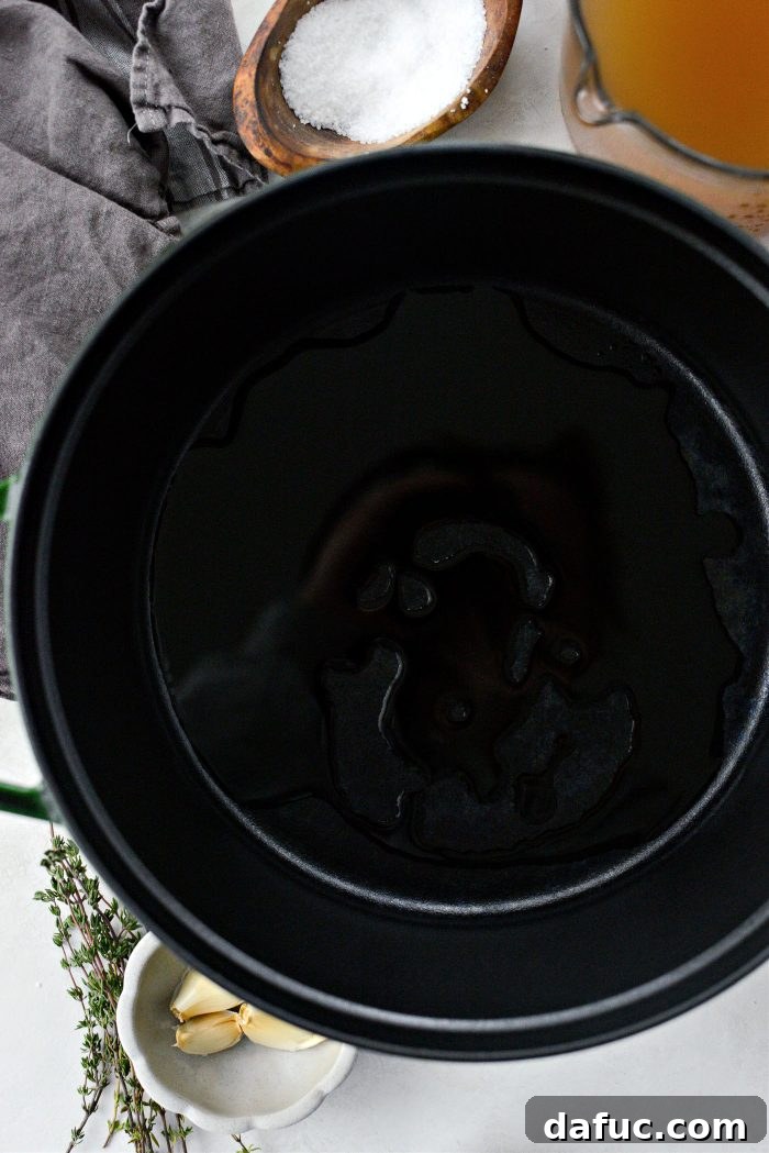 Sweet Onion Braised Beef 6 Heating avocado oil in a large Dutch oven over medium-high heat.