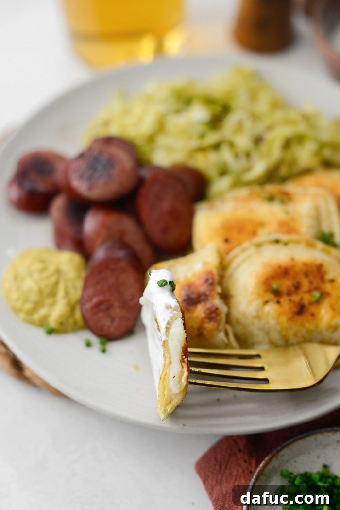Final close-up of the Sheet Pan Pierogies and Kielbasa with Cabbage