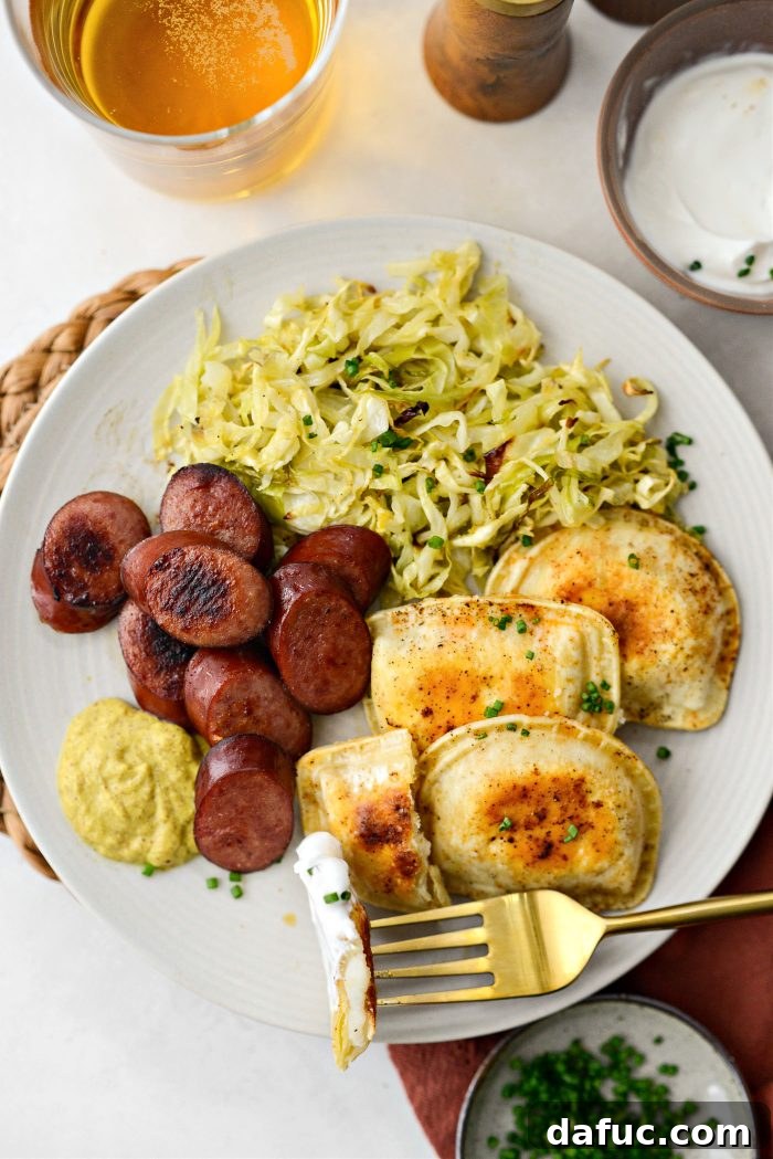 A second view of the Sheet Pan Pierogies and Kielbasa, showcasing the vibrant colors