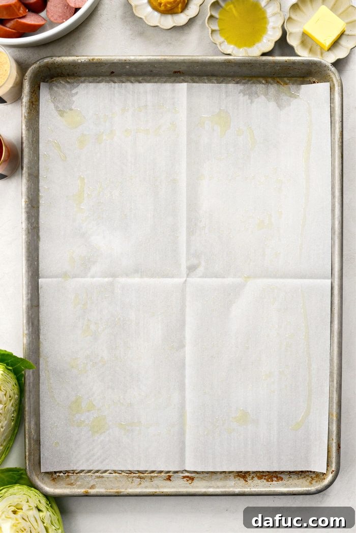 Preheating oven and preparing baking sheets with parchment paper
