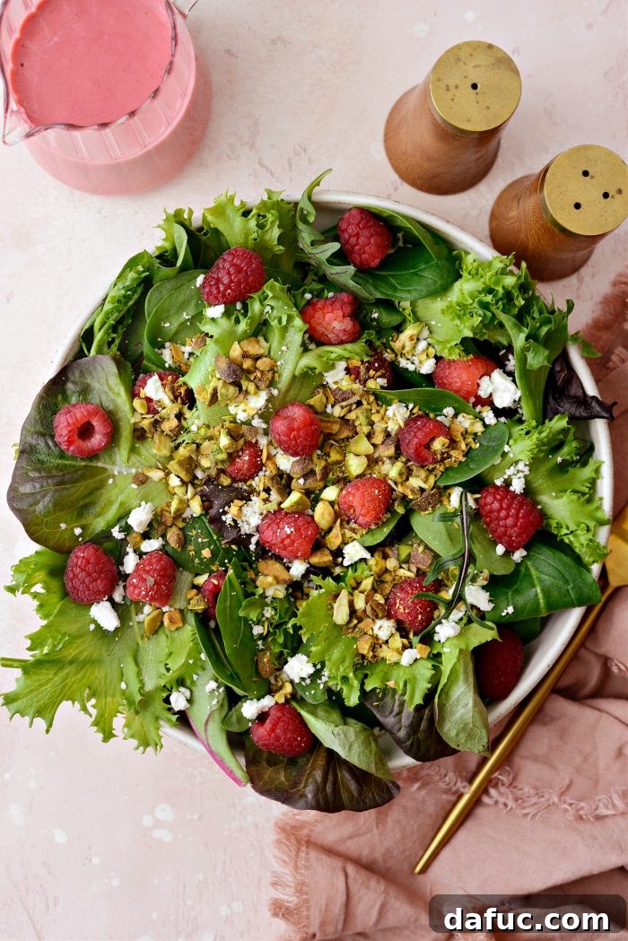 Ruby Red and Green Pistachio Salad 6 Ingredients for the Raspberry Pistachio Salad before assembly: leafy greens, raspberries, feta, pistachios
