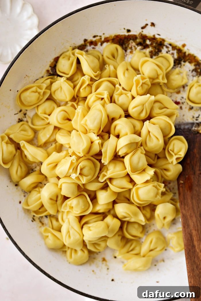 add uncooked tortellini