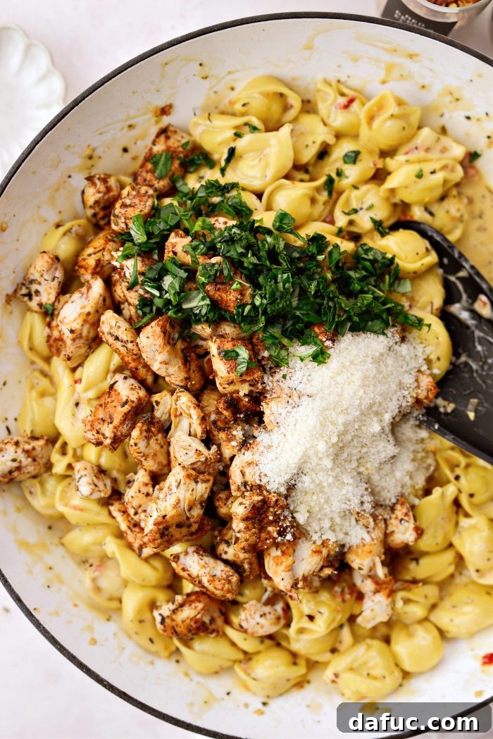 add chicken back in with basil and 1/4 cup parmesan cheese
